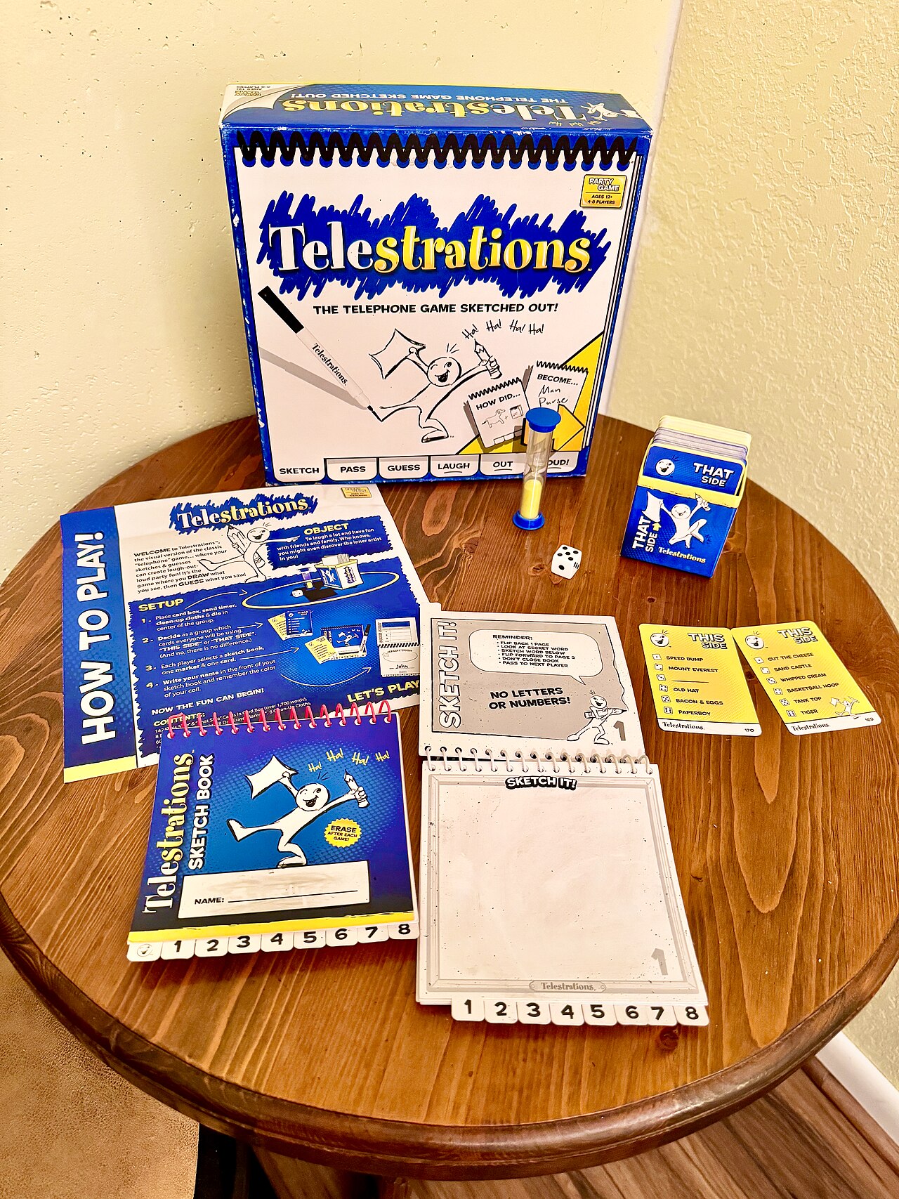 Telestrations party game of drawing and guessing
