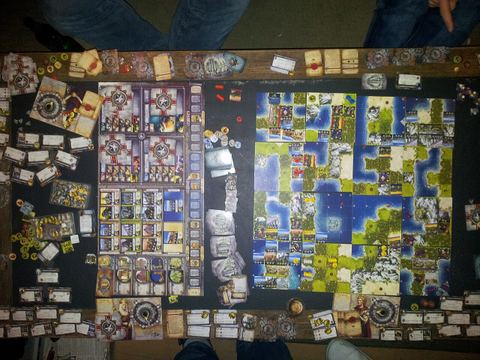 Table setup in a 4 Player lategame Civilization: The Board Game including the Fame and Fortune" expansion.