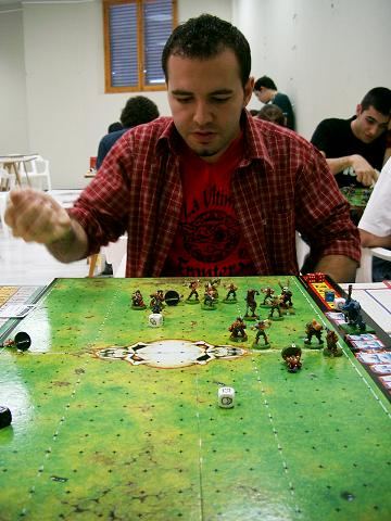 One guy playing Bloodbowl in competition