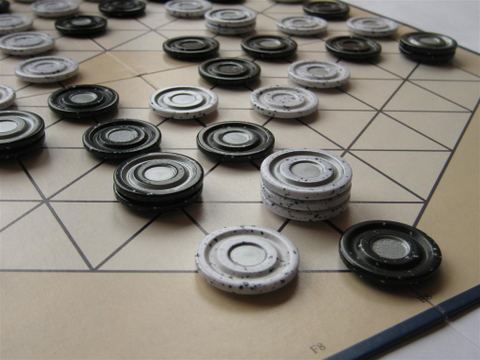Detail of the Tzaar board and pieces