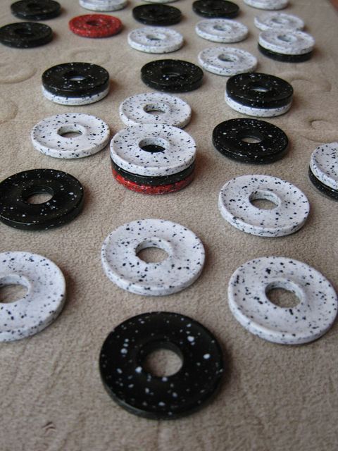 Detail of the board an pieces of a DVONN game