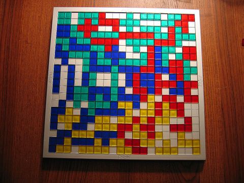 Blue and green both succeeded in playing all our tiles in a recent four player game of Blokus. :-)