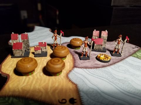 Painted figures in Spirit Island baordgame