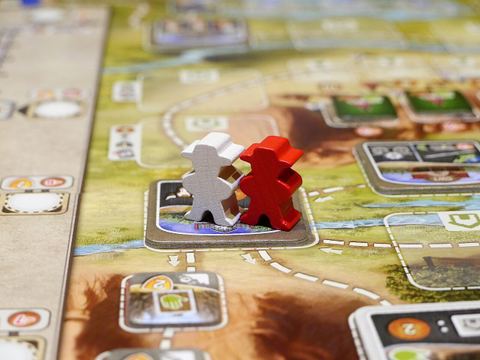 Herders on the trail in the board game Great Western Trail