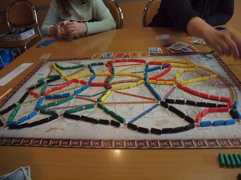 A game of Ticket to Ride at the end of the game, played at the Ticket to Ride Finnish Championships at JunaCon V in Turku, Finland. Winning the Finnish Championship qualifies for entry to the World Championship in Paris, France, in autumn. Winning the World Championship awards a luxury train trip in southeast Asia for two people for one week.