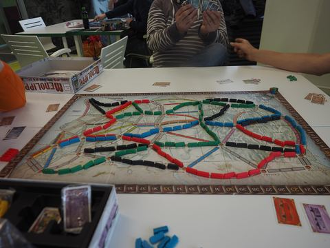 A four-player game of Ticket to Ride at the end of play at the Ticket to Ride Finnish championships at JunaCon 2020 in Kupittaa, Turku, Finland.